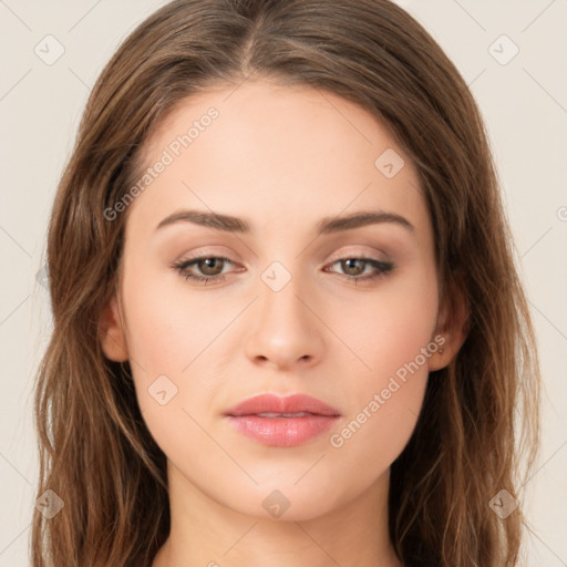 Neutral white young-adult female with long  brown hair and brown eyes