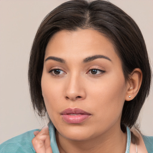 Neutral white young-adult female with medium  brown hair and brown eyes