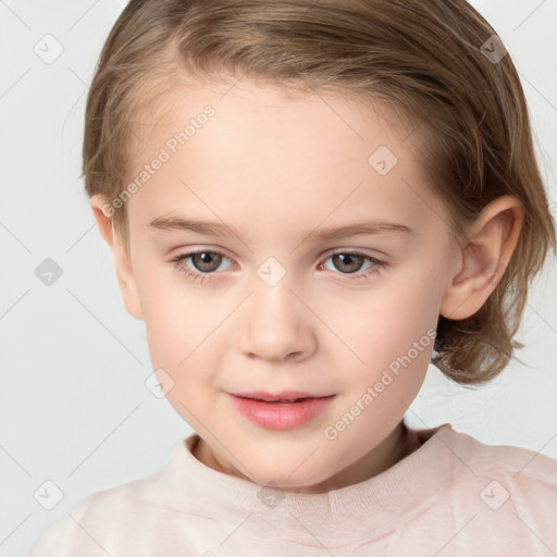 Joyful white child female with short  brown hair and brown eyes