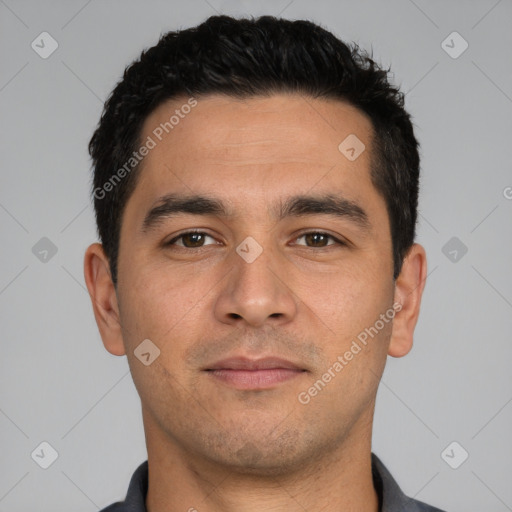Neutral white young-adult male with short  black hair and brown eyes