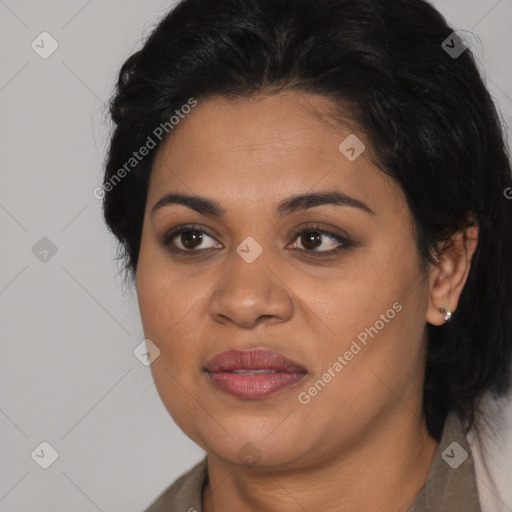 Joyful latino young-adult female with medium  brown hair and brown eyes