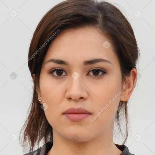 Neutral white young-adult female with medium  brown hair and brown eyes