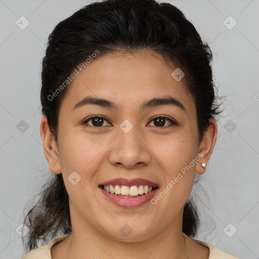 Joyful latino young-adult female with short  brown hair and brown eyes