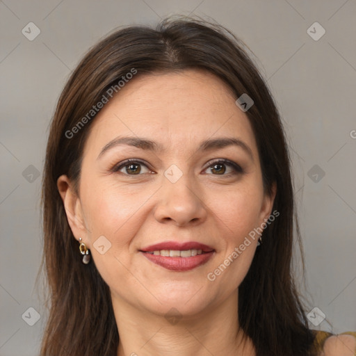 Joyful white adult female with medium  brown hair and brown eyes