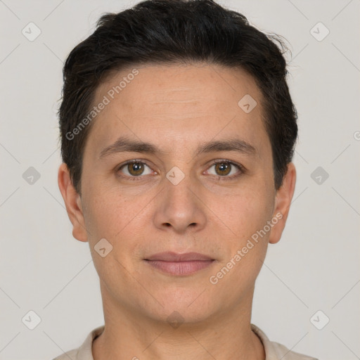 Joyful white adult male with short  brown hair and brown eyes