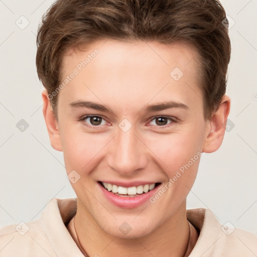 Joyful white young-adult female with short  brown hair and brown eyes