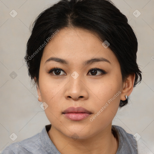 Neutral asian young-adult female with medium  black hair and brown eyes