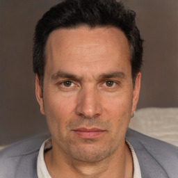Neutral white adult male with short  brown hair and brown eyes