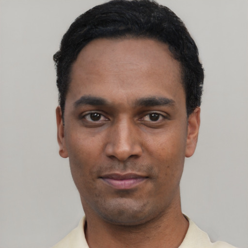 Neutral black young-adult male with short  black hair and brown eyes