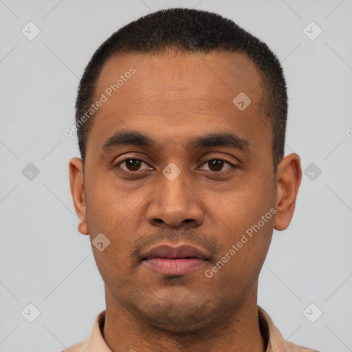 Neutral latino young-adult male with short  black hair and brown eyes