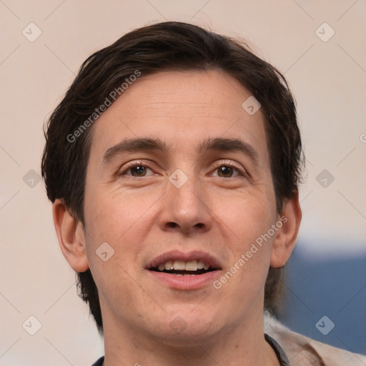 Joyful white adult male with short  brown hair and brown eyes