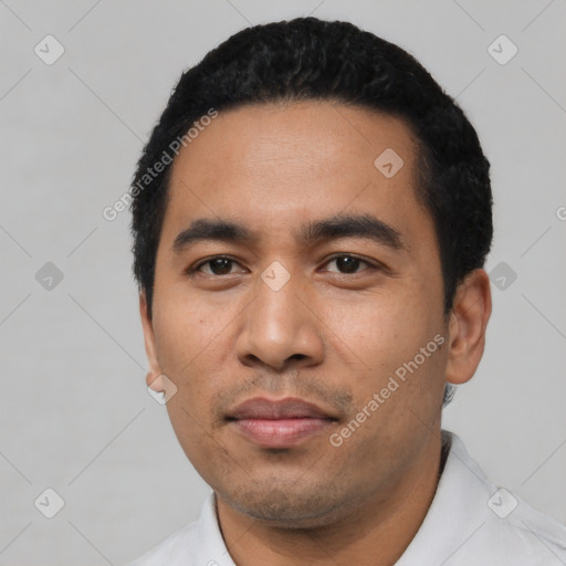 Neutral latino young-adult male with short  black hair and brown eyes
