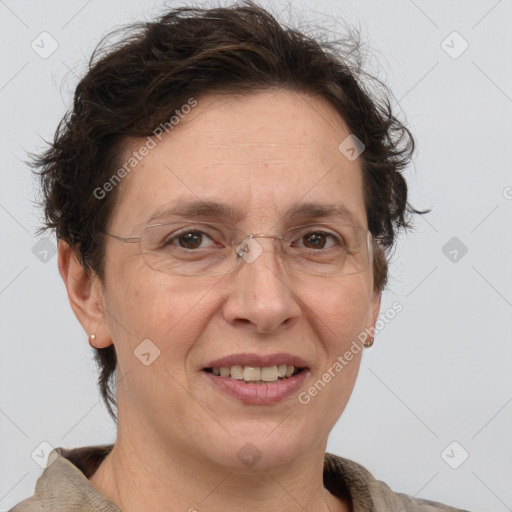 Joyful white adult female with short  brown hair and grey eyes