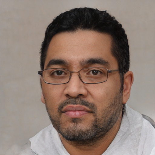Neutral asian adult male with short  black hair and brown eyes