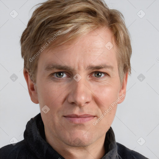 Joyful white adult male with short  brown hair and grey eyes