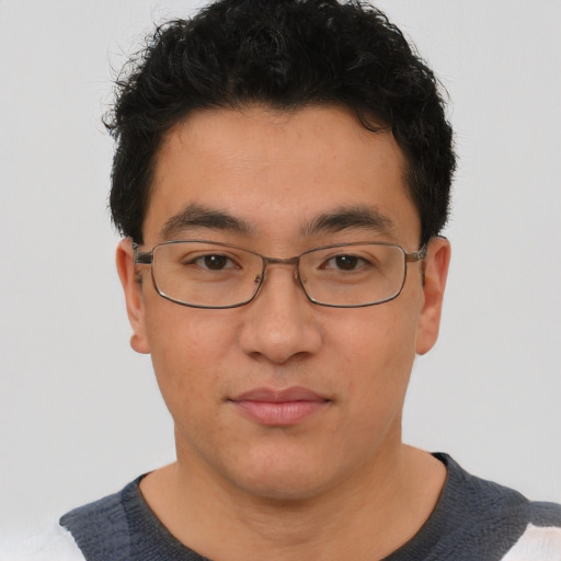 Neutral asian young-adult male with short  brown hair and brown eyes