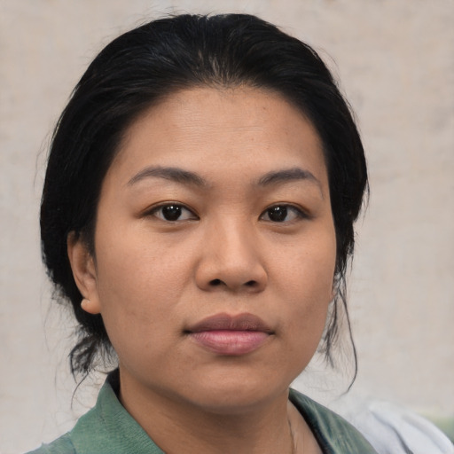 Neutral asian young-adult female with medium  black hair and brown eyes