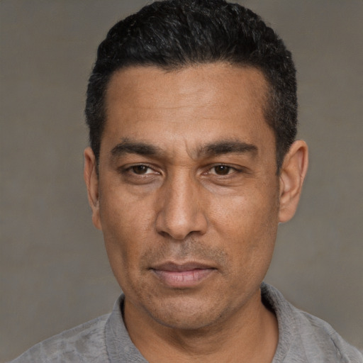 Neutral white adult male with short  black hair and brown eyes