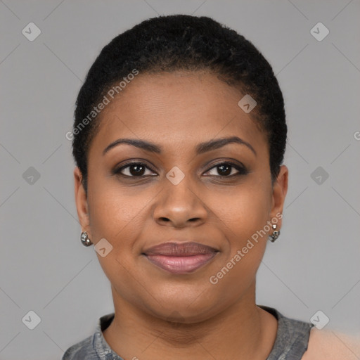 Joyful black young-adult female with short  brown hair and brown eyes