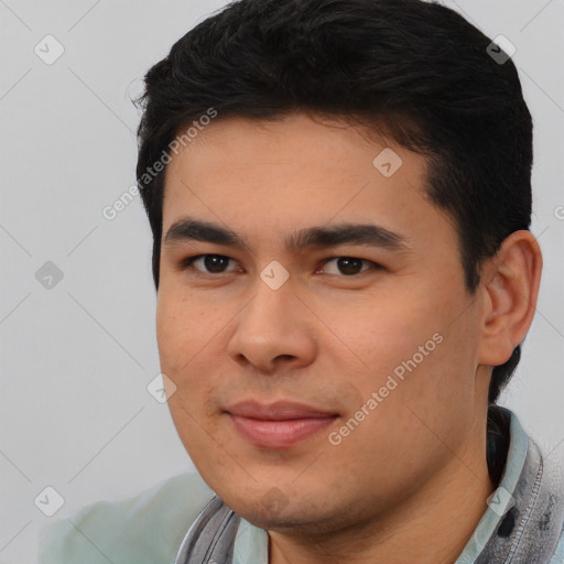 Joyful latino young-adult male with short  black hair and brown eyes