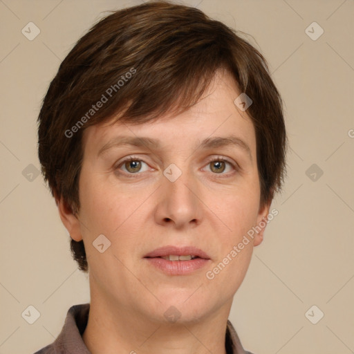 Joyful white adult male with short  brown hair and grey eyes