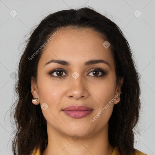 Joyful latino young-adult female with long  brown hair and brown eyes