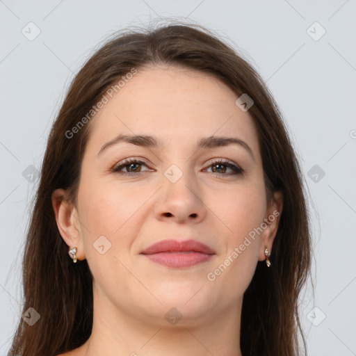 Joyful white young-adult female with long  brown hair and grey eyes