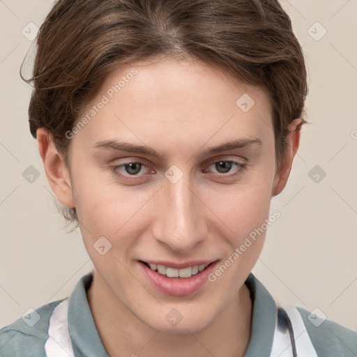 Joyful white young-adult female with short  brown hair and grey eyes