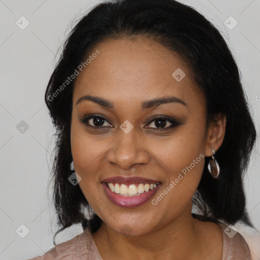 Joyful black young-adult female with long  brown hair and brown eyes