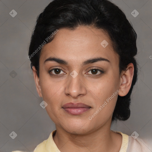 Joyful latino young-adult female with short  brown hair and brown eyes