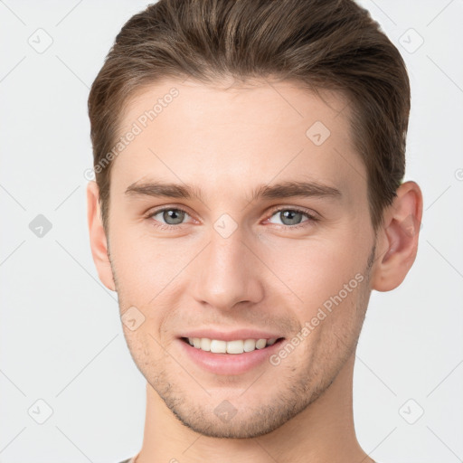 Joyful white young-adult male with short  brown hair and brown eyes