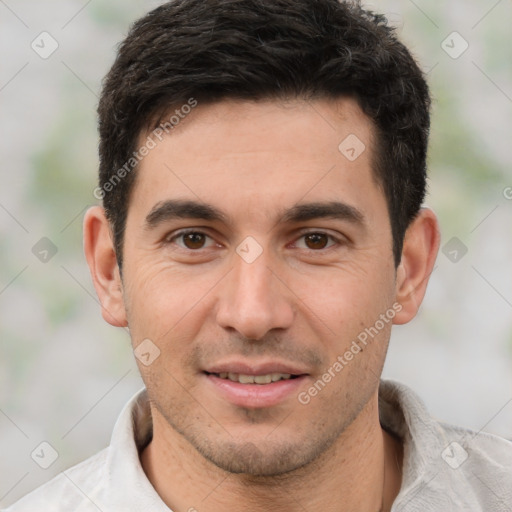 Joyful white young-adult male with short  brown hair and brown eyes