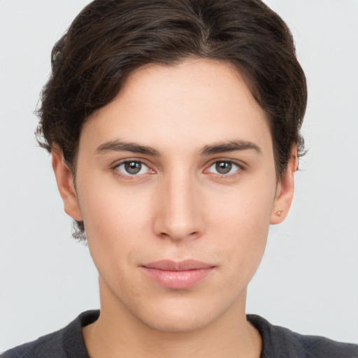 Neutral white young-adult female with short  brown hair and brown eyes