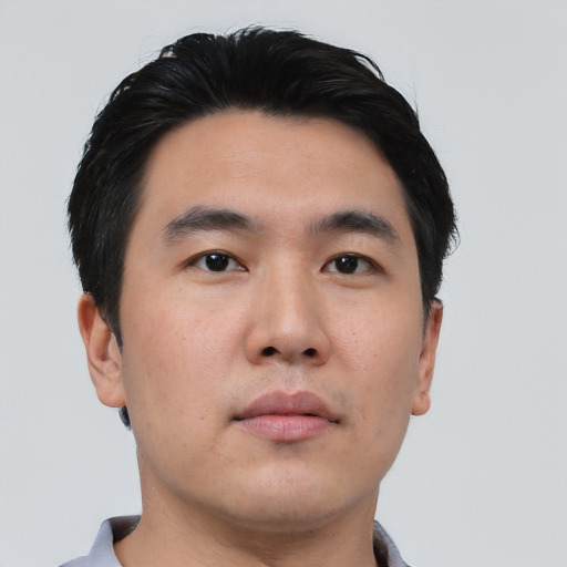 Neutral asian young-adult male with short  black hair and brown eyes