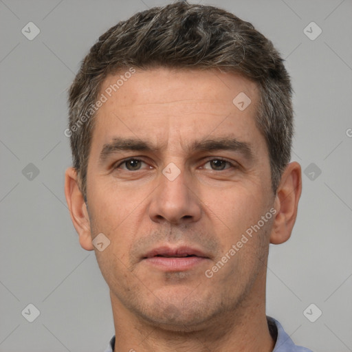 Neutral white adult male with short  brown hair and brown eyes