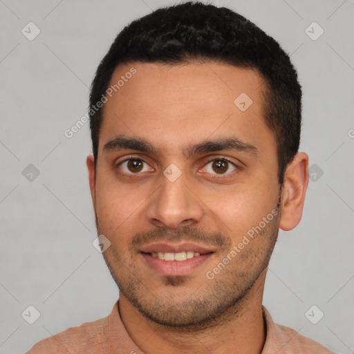 Joyful white young-adult male with short  black hair and brown eyes