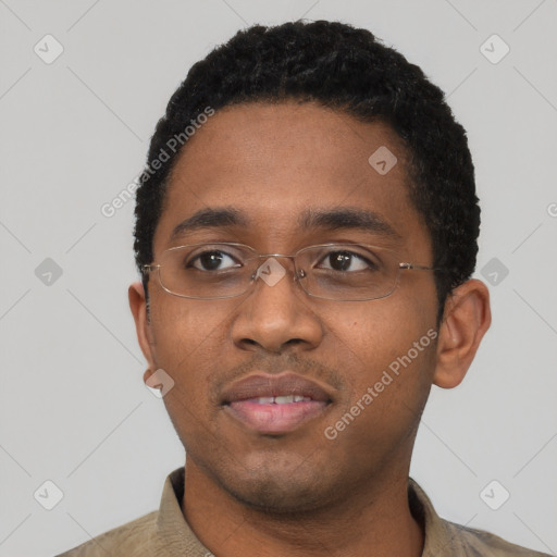 Neutral black young-adult male with short  black hair and brown eyes