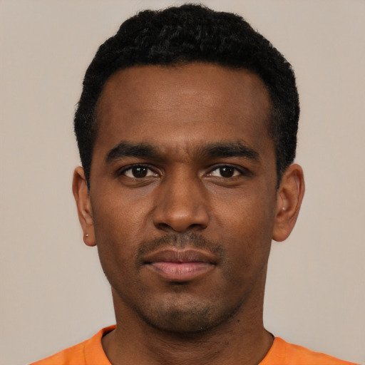 Neutral black young-adult male with short  black hair and brown eyes