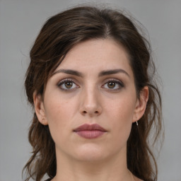 Neutral white young-adult female with medium  brown hair and brown eyes