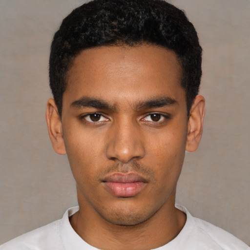 Neutral latino young-adult male with short  black hair and brown eyes