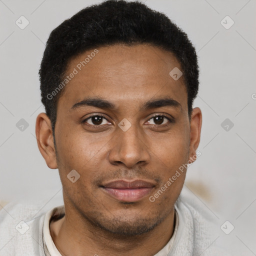 Joyful black young-adult male with short  brown hair and brown eyes