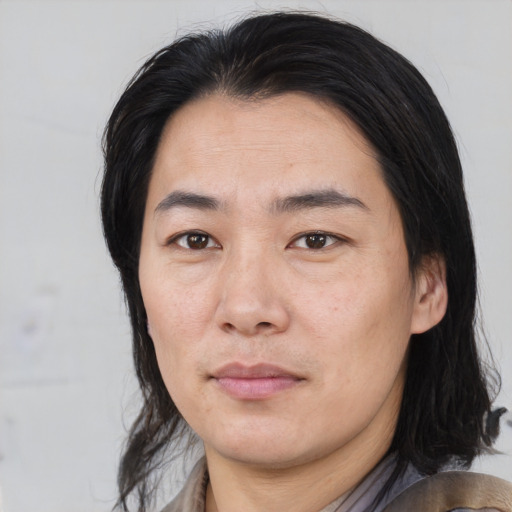 Neutral asian adult male with medium  black hair and brown eyes