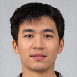 Neutral asian young-adult male with short  brown hair and brown eyes