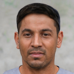 Neutral white young-adult male with short  black hair and brown eyes