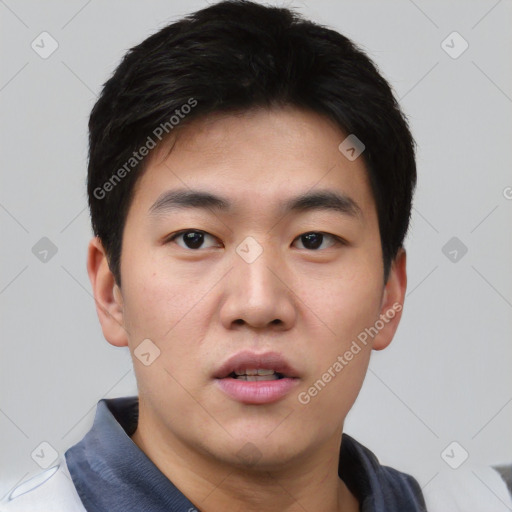 Neutral asian young-adult male with short  black hair and brown eyes