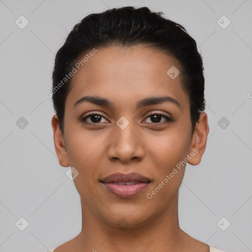 Joyful latino young-adult female with short  black hair and brown eyes