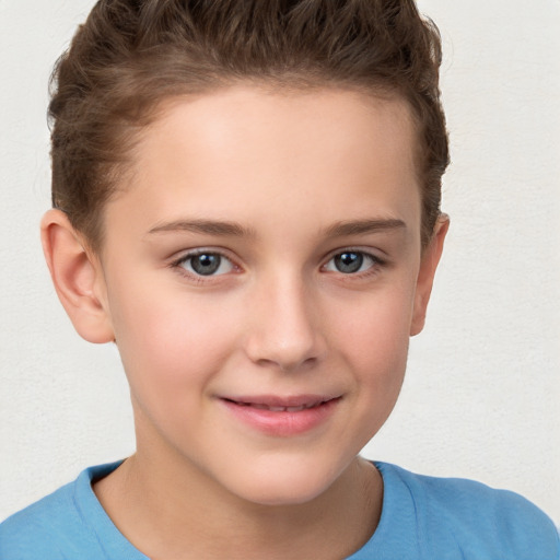 Joyful white child female with short  brown hair and brown eyes