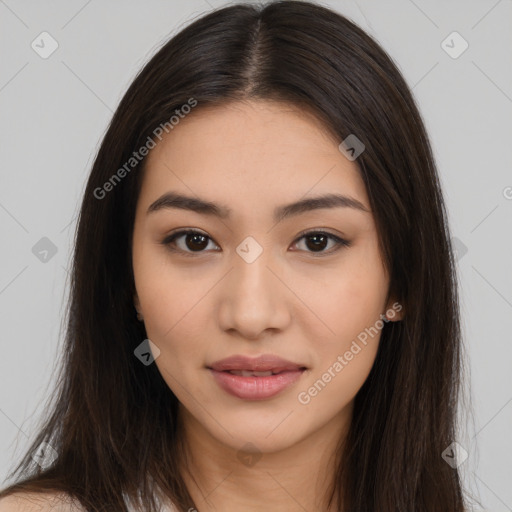 Joyful latino young-adult female with long  brown hair and brown eyes