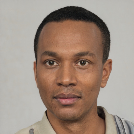 Neutral black young-adult male with short  black hair and brown eyes