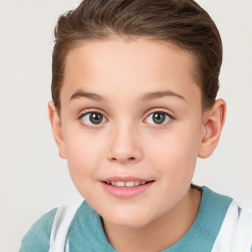 Joyful white child female with short  brown hair and brown eyes